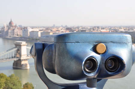 Retro telescope and blurred city of Budapest Hungaryの写真素材