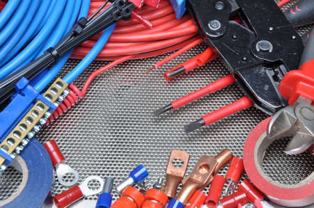 Electrical tools, component and cables on metal surfaceの写真素材
