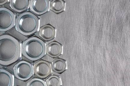 Nuts on gray metal background