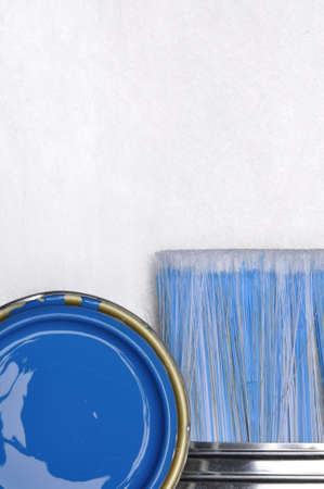 Top view of blue paint can with brush on gray metal backgroundの写真素材