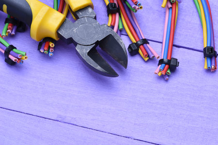 Tool and cable for electrical installation on wooden board