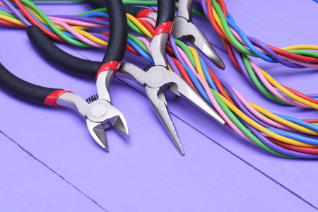 Tool and cable for electrical installation on wooden board