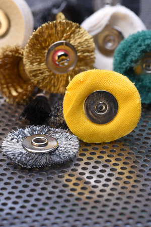 Set of mini rotary drill tools on metal surface