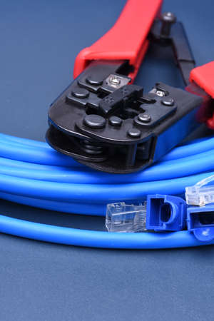 Crimping tool with cable for computer networkの写真素材