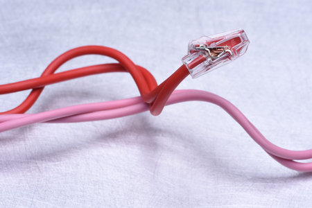 Closeup of the electric cables on metalic gray backgroundの写真素材