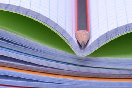 Exercise books and pencilの写真素材