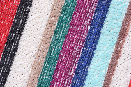 Multicolored stripes fabric for washing dishes as background
