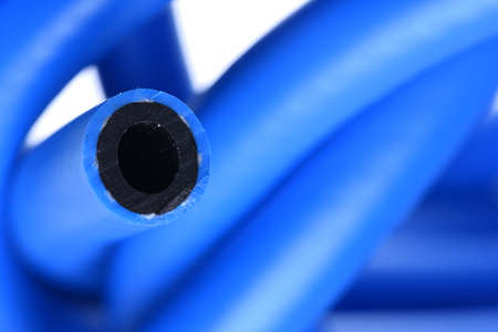 Pressure hose on white backgroundの写真素材