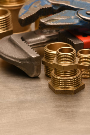 Wrench and brass fittings closeupの写真素材