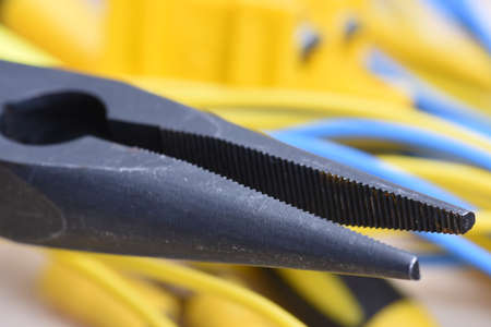 Close up pliers and electrical cablesの写真素材
