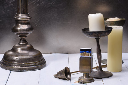 Old Candlestick With Candle and Accessoryの写真素材