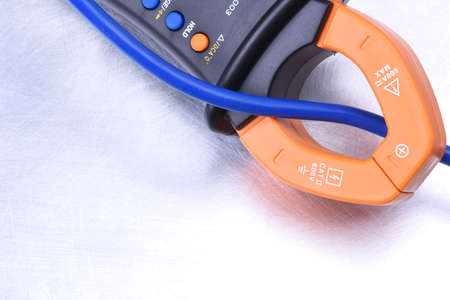 Clamp meter tool with cable, measuring electrical installationsの写真素材