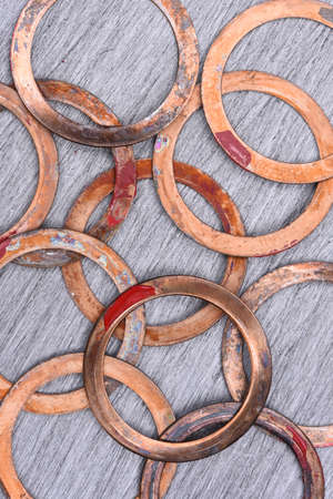 Old Copper Washers on Metal Background, Top Viewの写真素材