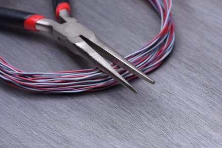 Electrical and Cable Tool on Metal Background with Copy Space