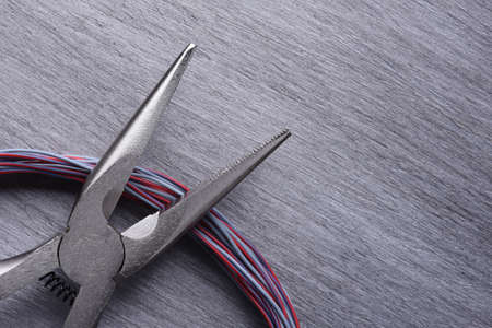 Electrical and Cable Tool on Metal Background with Copy Spaceの写真素材