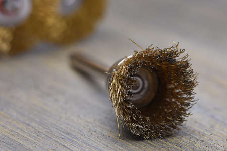 Steel Wire Wheel Brushes for Cleaning on Metal Background with Selective Focusの写真素材