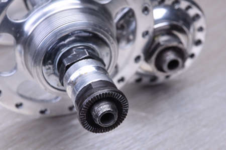 Old bike hub closeup, service of vintage steel bikeの写真素材