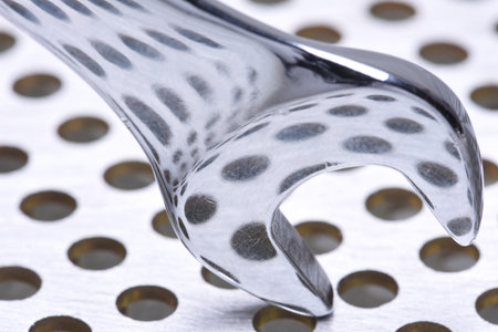 Wrench close up on metal backgroundの写真素材