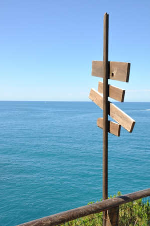 Empty sign point on the sea shoreの写真素材