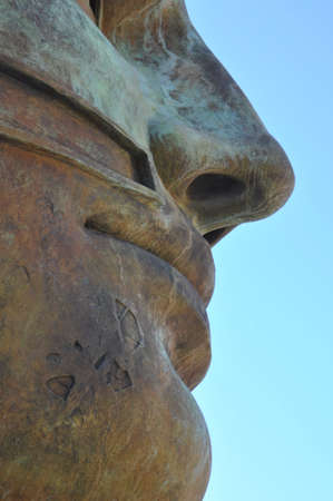Man's face sculpture in bronzeの写真素材