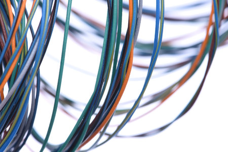 Colorful electrical cables on white background