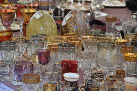 Old carboy damigiana glass for wine on flea marketの写真素材