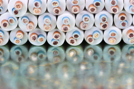 Electric cables closeup on metal boardの写真素材