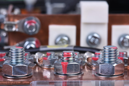 Copper bus connector for industrial power supply devices with bold connection close-up, detail of...
