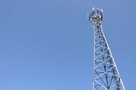 Communication tower with blue skyの写真素材