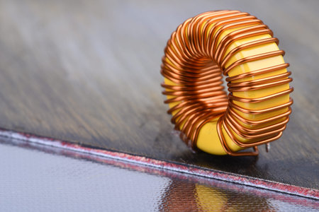 Inductor copper coil on metal background