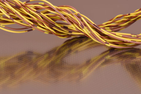 Colorful electrical telecommunication cables on metallic surface with reflection