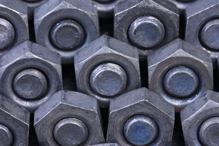 Steel bolts and nuts close-up