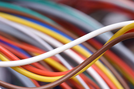 Closeup of electric cable and computer network systems with selective focus