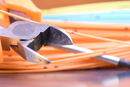 Closeup of tools and cables used in electrical home installation