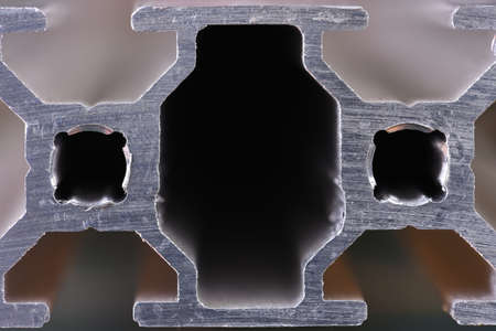 Cross sections of aluminum profiles close-up front viewの写真素材