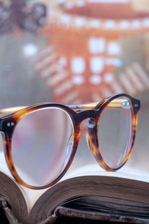 Soft focus reading brown glasses close-upの写真素材
