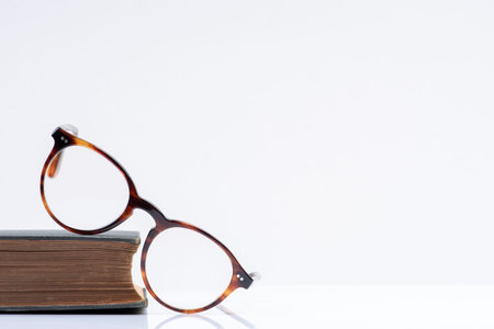 Book and glasses concept for educationの写真素材
