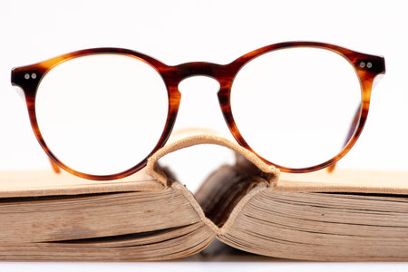 Open book and glasses concept studying