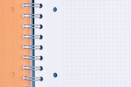 Paper spiral notebook isolated on white