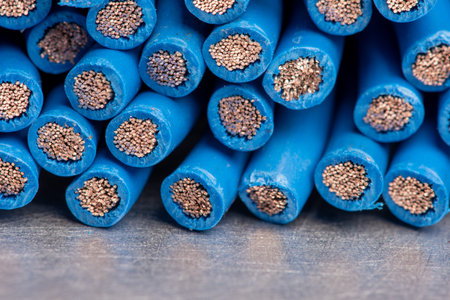 Electrical copper cable on metallic surface
