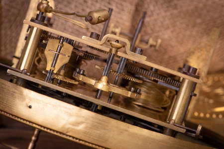 Old antique clock mechanism close-upの写真素材