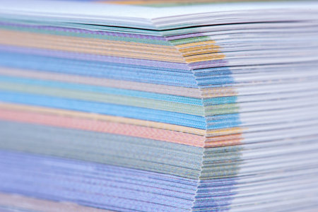 Macro of book page corner, stack of paper
