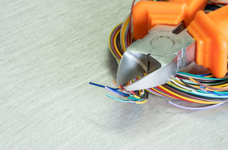 Pliers tool and electrical wire close-upの写真素材