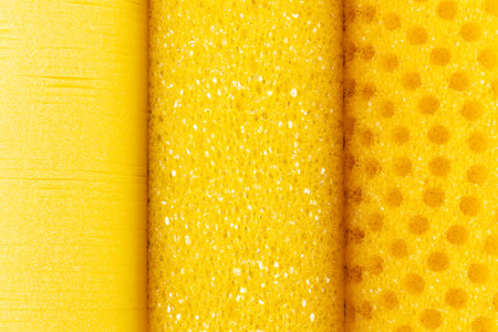 Yellow foam sponge roller texture for backgroundの写真素材