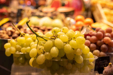 Bunch Of Grapes On Food Market Stall Barcelona Spainの写真素材