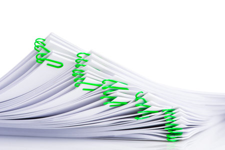 Office desk document with paper clip on white background
