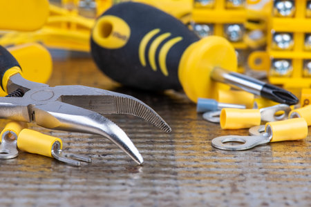 Electric manual tool and accessories on workshop table