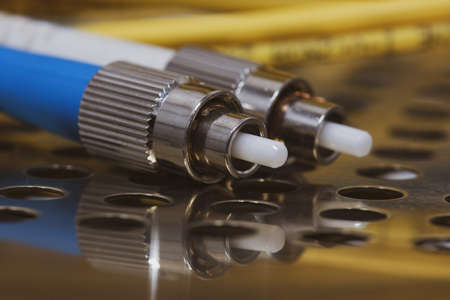 Fiber optic patch cord, speed internet network telecom and technologyの写真素材