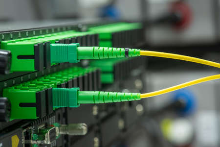 Information Technology Computer Optical Network Equipment in Data Center Closeupの写真素材
