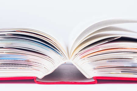 Opened book with bookmaks close-upの写真素材